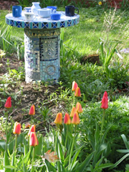 well cover mosaic in spring